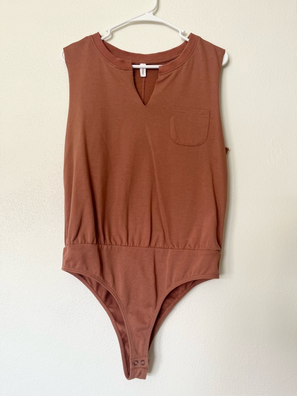 NWOT Sleeveless One-Piece Bodysuit in Rust